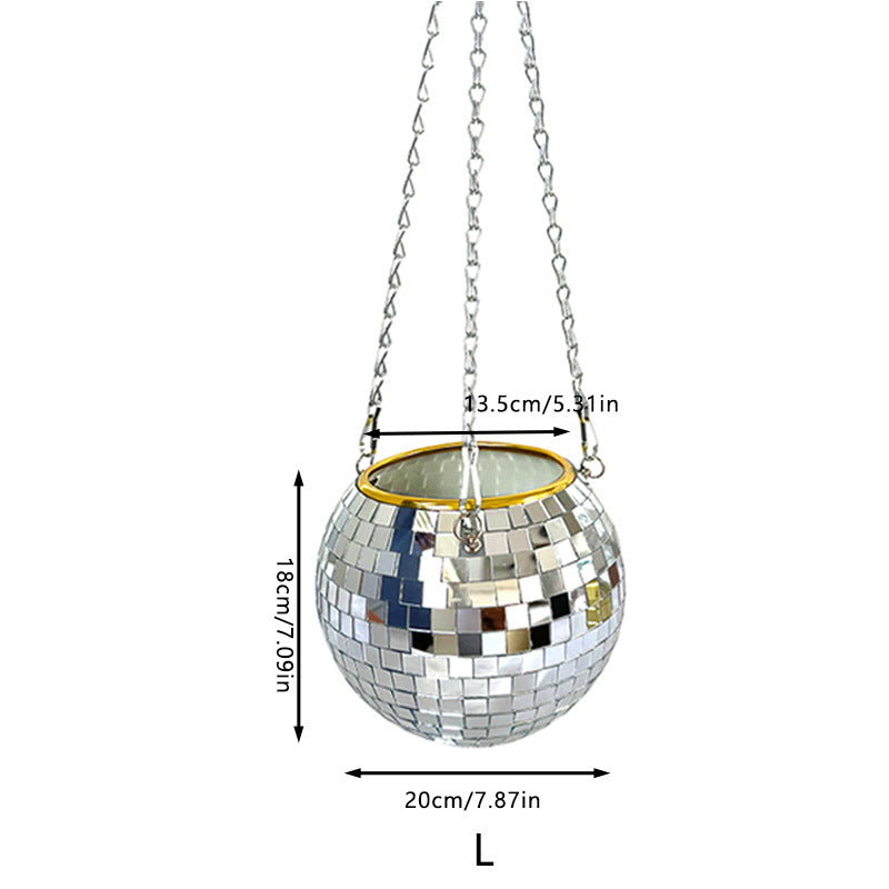 Maceta bola de disco con flores en interior boho